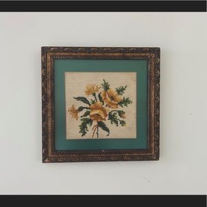Vintage cross stitch of yellow flowers